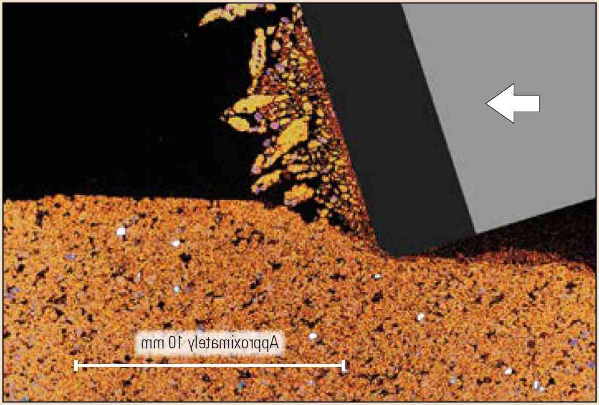 使用微ct扫描成像的横截面显示了PDC切削齿穿过砂岩(橙色)的动作. 